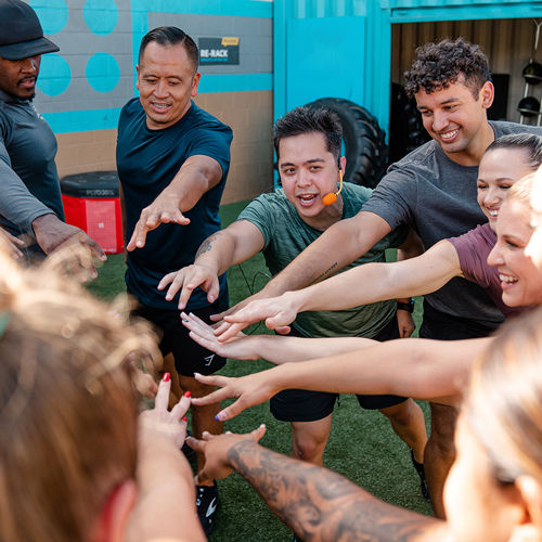 an outdoor group class with a group fitness instructor